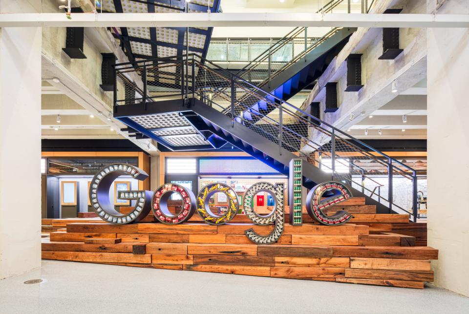 A multicoloured Google sign on wood