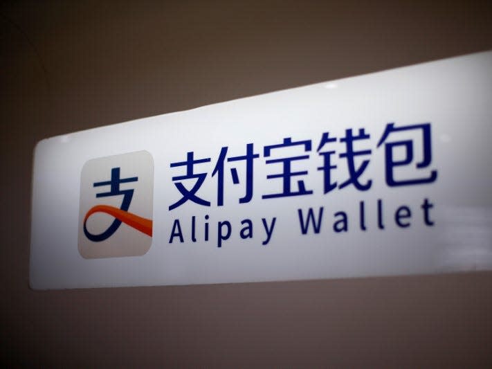 An Alipay logo is seen at a train station in Shanghai, China February 9, 2015. REUTERS/Aly Song/File Photo