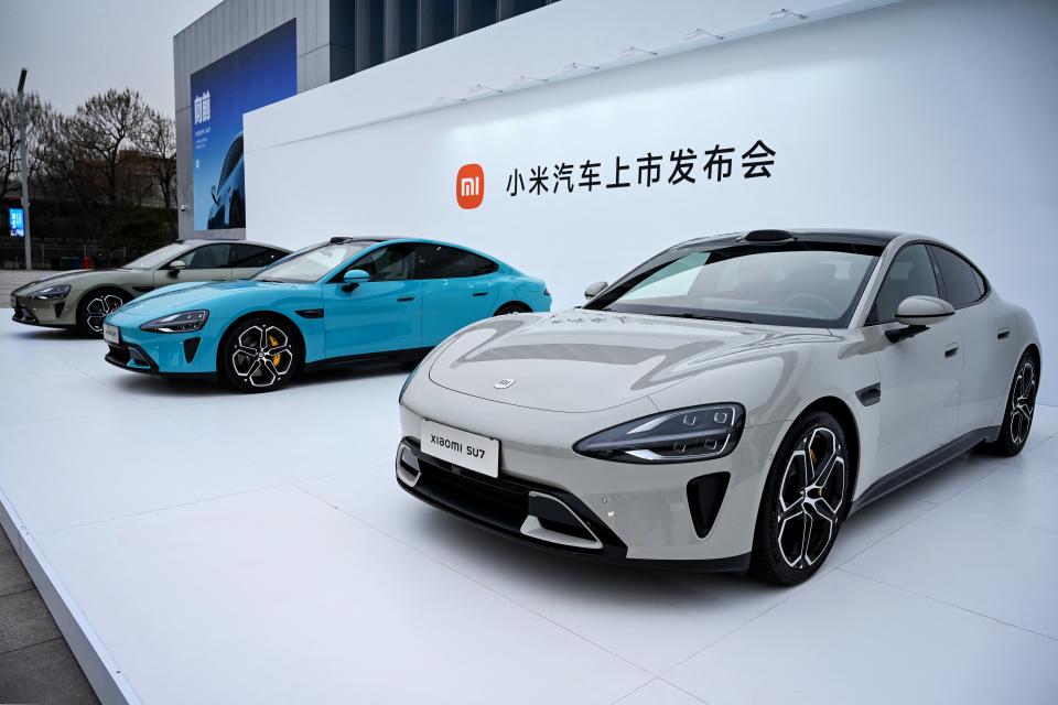 Xiaomi SU7 cars at a launch event in Beijing