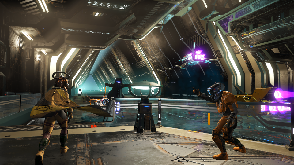 Interior of new procedurally generated space stations in the game No Man's Sky. Three characters stand in action poses in the foreground of a space hangar as ships whizz by.