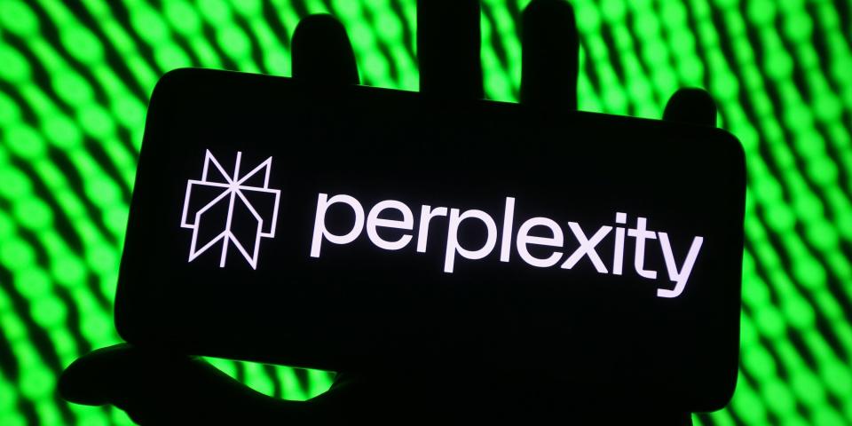 A photo illustration shows the Perplexity logo on a mobile phone.