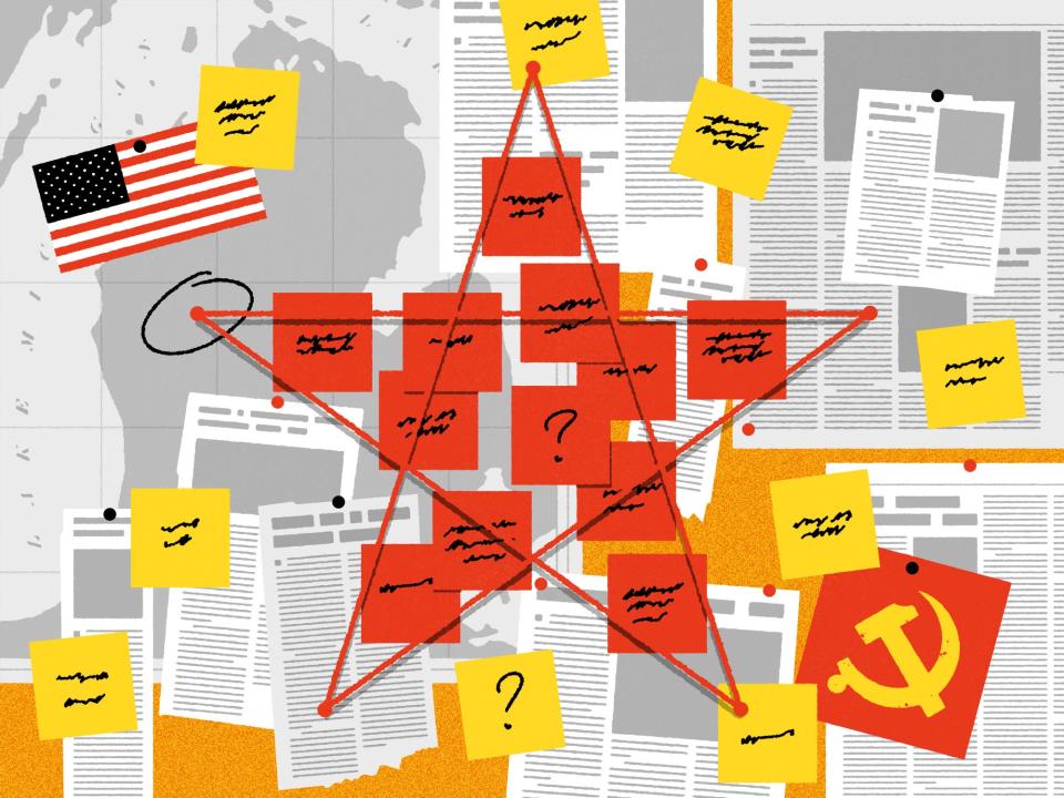 A conspiracy bin board, with red string and sticky notes forming a Communist Red Star symbol.