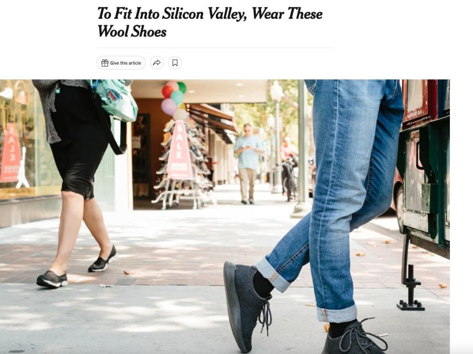 A screenshot of an article by The New York Times article with an image of a model wearing a pair of Allbirds sneakers.
