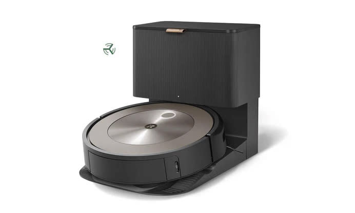 Product marketing image for the iRobot Roomba J9+. The robot vacuum sits in its cleaning station against a white background.