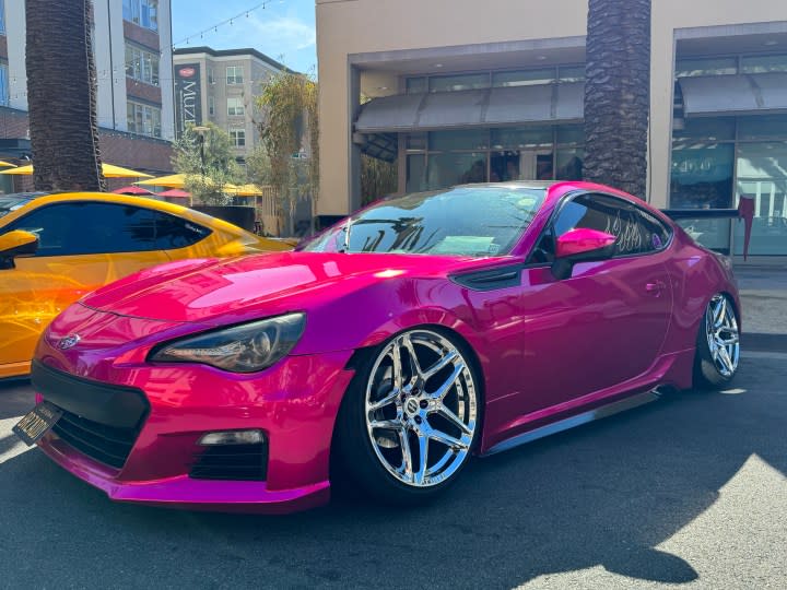 Hot pink Subaru.