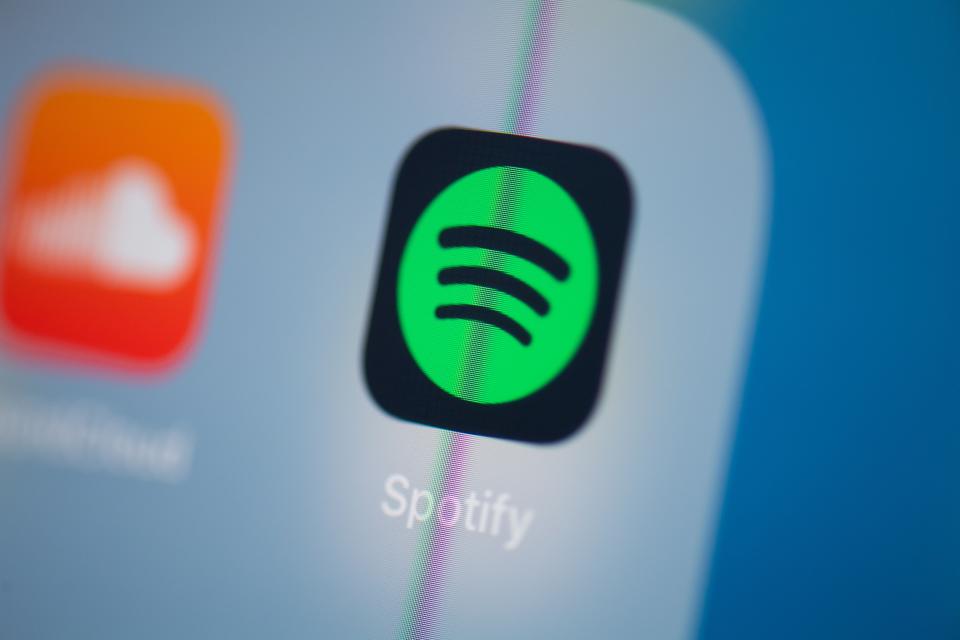 This illustration picture taken on July 24, 2019 in Paris shows the logo of the Swedish music streaming application Spotify on the screen of a tablet.