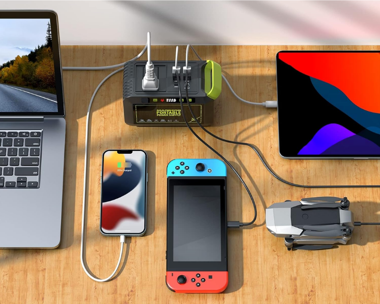 power station charging macbook, iphone, ipad, nintendo switch