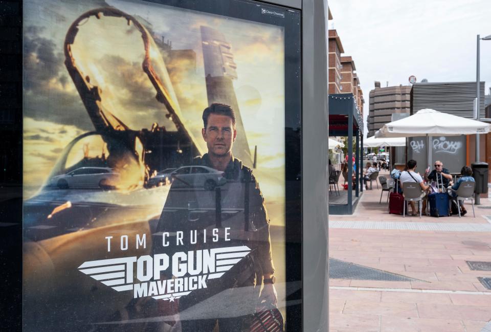 Poster of "Top Gun Maverick" movie on a bus shelter.