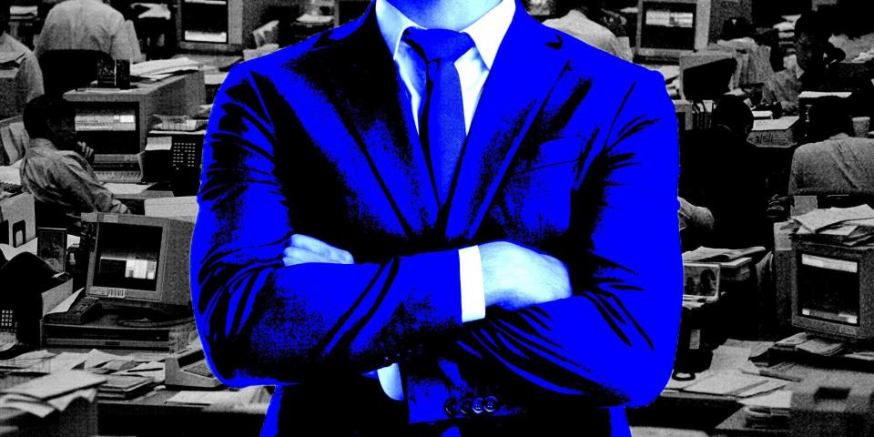 A man in a blue suit against a black and white background.