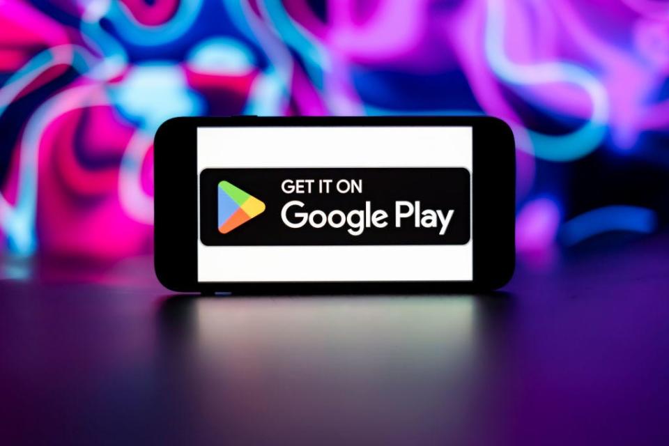 A smartphone displays the Google Play Store logo, which reads "Get it on Google Play."